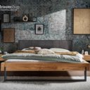 Balkenbed met stoffen hoofdbord