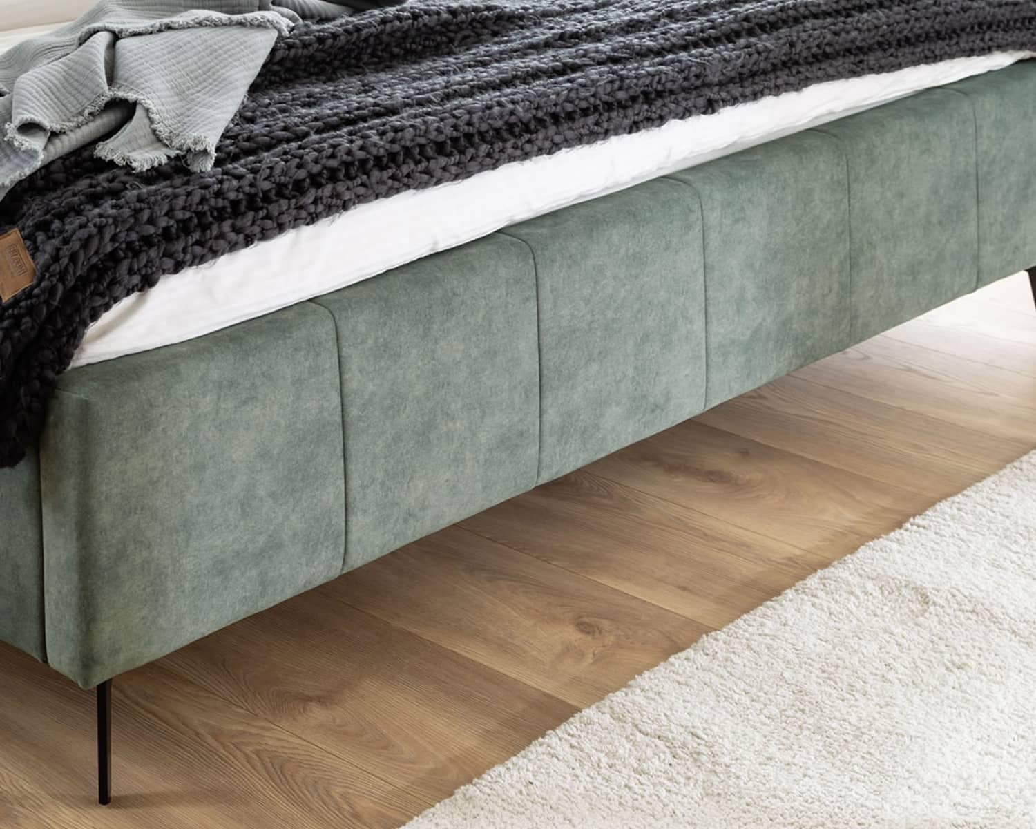 Gestoffeerd bed groen