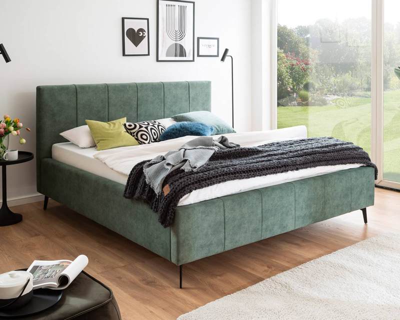 Groen stoffen bed