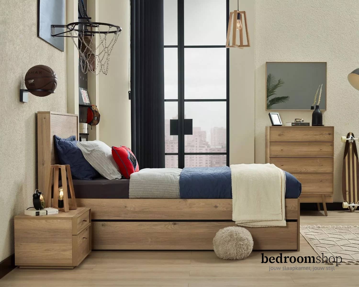 Eenpersoonsbed met logeerbed