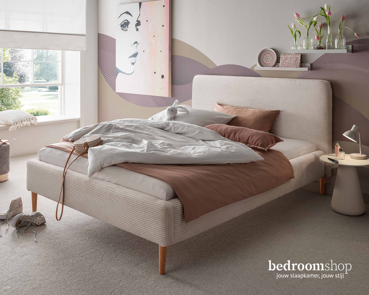Beige stoffen bed