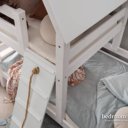 Speelhuis op bed