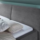Grijs stoffen bed ribbeltjes stof