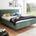 Groen stoffen bed