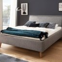 Grijs stoffen bed