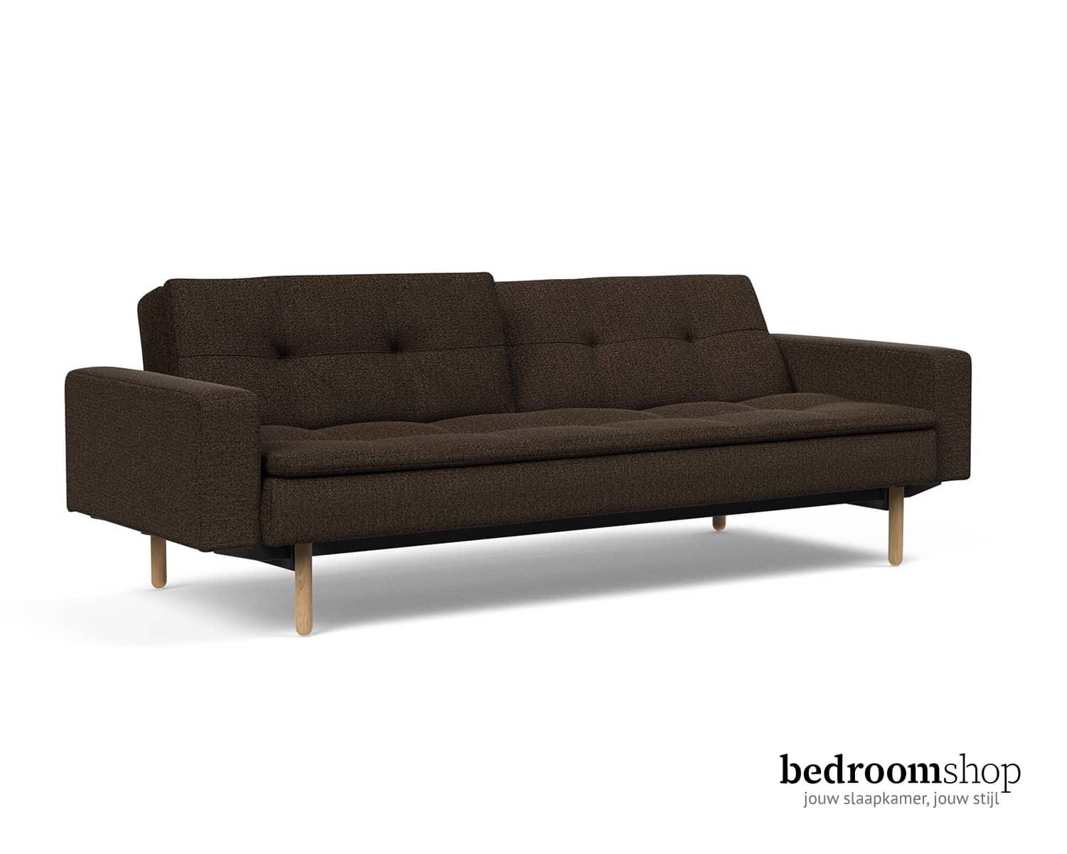 Bruine slaapbank met ronde lichte poot